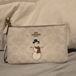 Coach Beige Wristlet with Snowman Motif